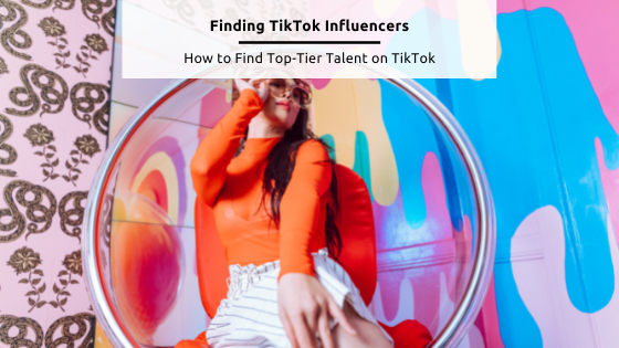 Finding TikTok Influencers - Free stock image from Canva of a woman posing in front of a brightly colored wall