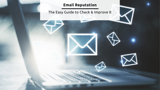 Email Reputation - Stock image from canva of a laptop open with email-letter graphics floating around it